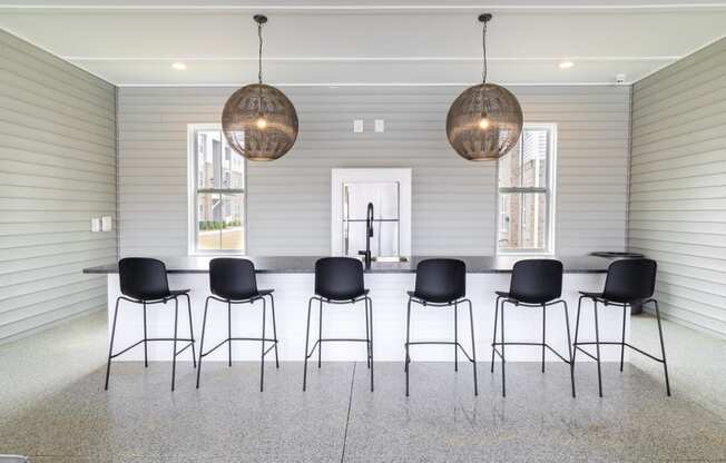 a large dining room with a long table and chairs