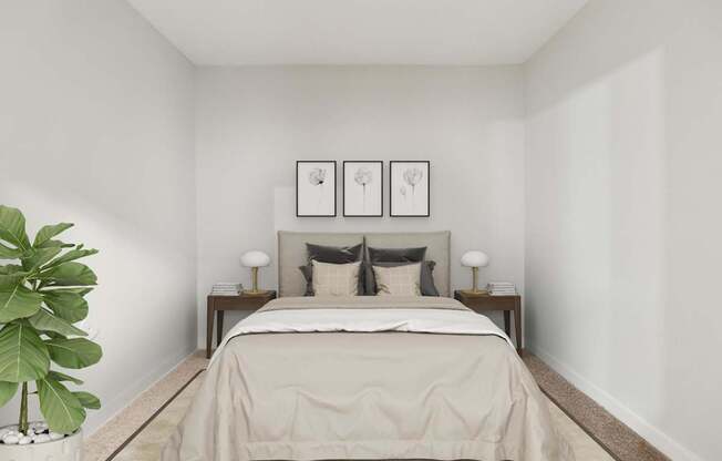 A bedroom with a bed, two lamps, and two pictures on the wall.