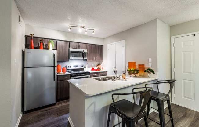 updated kitchen with stainless steel appliances