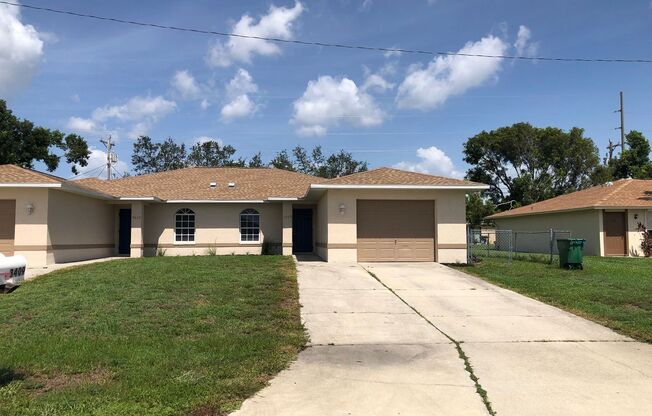 3 Bedroom 2 Bath SW Cape Coral Duplex with Garage and Screened Lanai