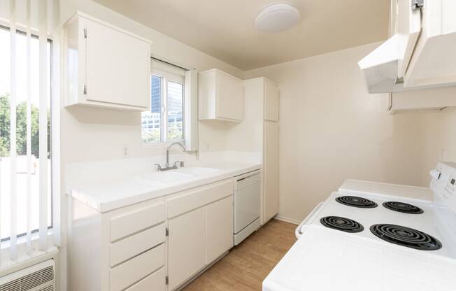 Kitchen with White Appliances and White Cabinets