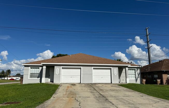 Experience this Cape Coral 3 bedroom 2 bath corner duplex with 1 car garage and screened in lanai.