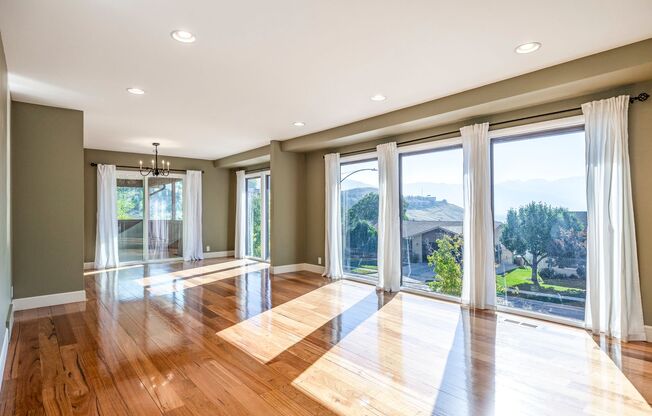 Upper Avenues Stunner with Breathtaking Views and Endless Space!