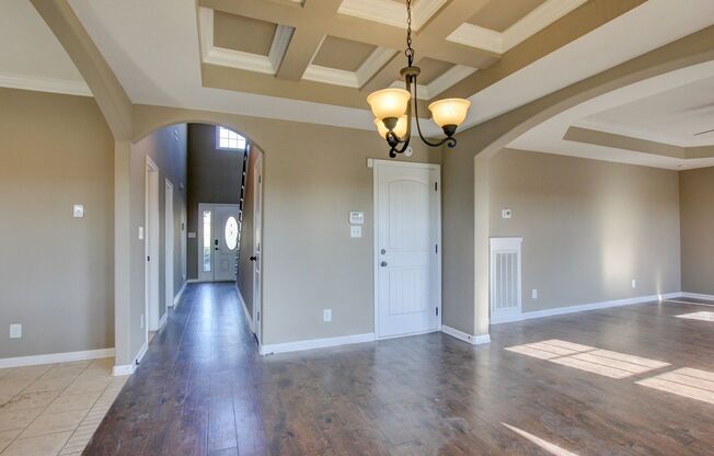 Stunning Five Bedroom With Hardwoods, Fireplace and Covered Patio in Sunset Meadows