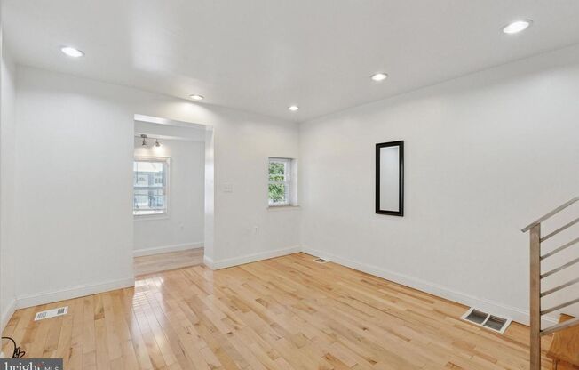 Updated 2BR Townhome with Dual Ensuite Baths, Hardwood Floors & Private Patio in Grays Ferry