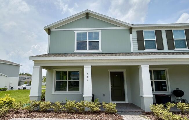 Stunning 3/2.5 Modern Townhome with a Loft Area in the New Rivington Community - DeBary!