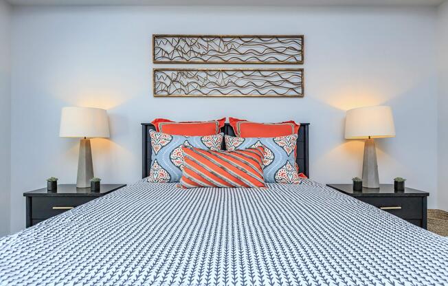 a bedroom with a large bed in a hotel room