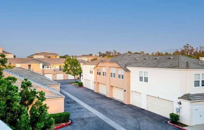 A residential area with houses and driveways.