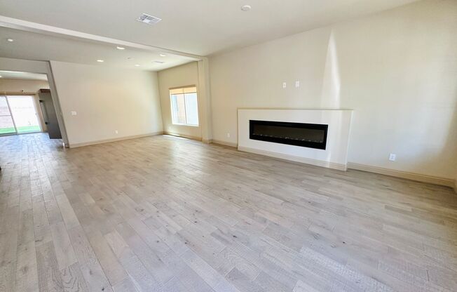 Stunning 4 bedroom 3.5 bath home with a 3 car garage! Home features many rare upgrades including real hardwood flooring, a wood framed shed, a large openable canopy, and pavers & turf! All windows have sun shades instead of blinds! All bedrooms have walk