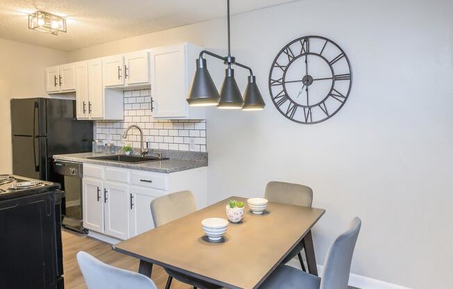 large dining room and table looking into kitchen