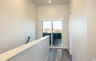hallway leading to staircase at Palisade Park Townhomes, Broomfield, 80023