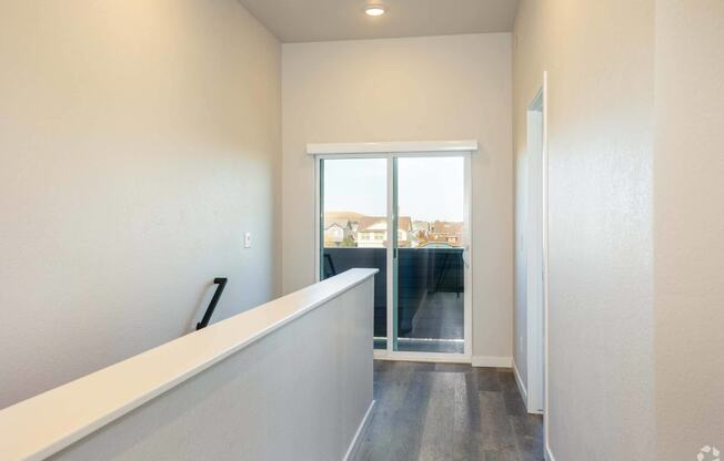 hallway leading to staircase at Palisade Park Townhomes, Broomfield, 80023
