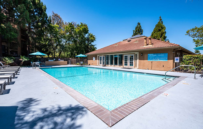 Richmond, CA Apartments - Exterior View of Bella Vista at Hilltop Apartments Building With View of Pool
