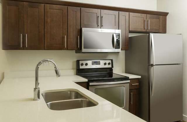 Sink With Faucet In Kitchen at Four Seasons Apartments & Townhomes, North Logan, 84341