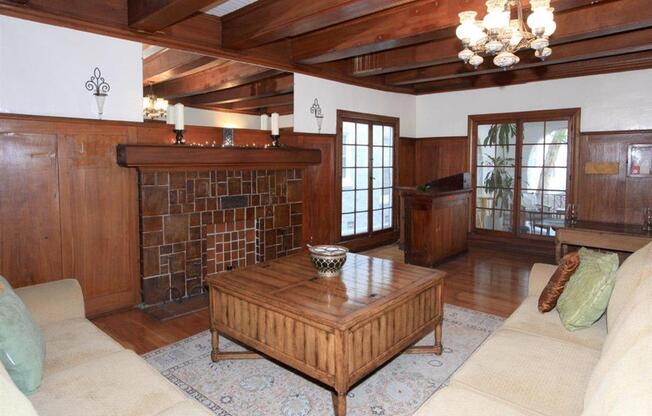 Lobby with large sectional couch and coffee table