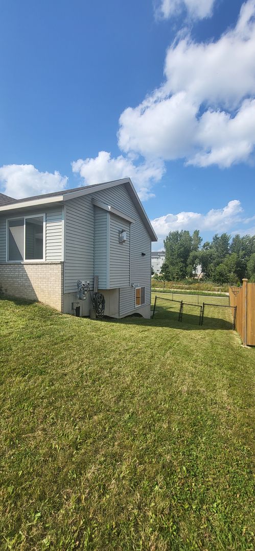 NW Rochester 4 bedroom 3 bath two car attached garage fenced yard