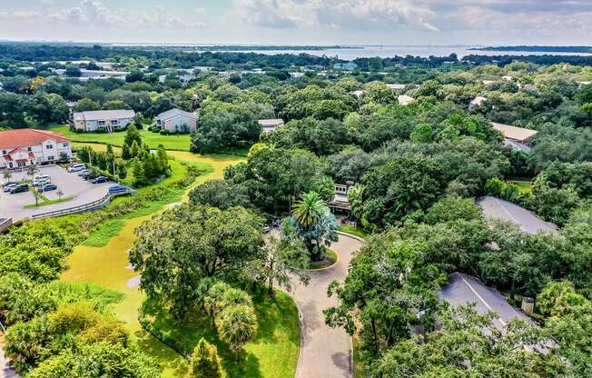 Aerial view of apartment complex with trees