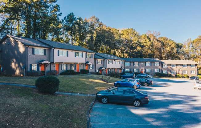 a row of houses with cars parked in front of them at Broadway at East Atlanta, Atlanta, 30316