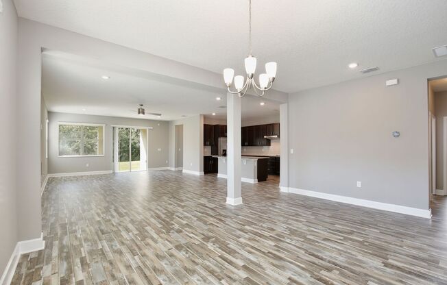 Gorgeous 4/3 Spacious Home with a 2 Car Garage Located on a Conservation Lot in Creekstone Neighborhood – Orlando!