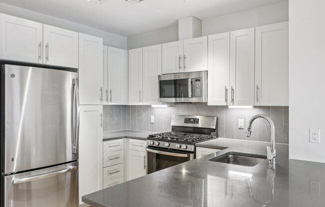 Kitchen with granite countertop at Park77 Apartments, Cambridge, Massachusetts