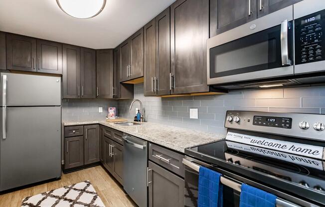 a modern kitchen with stainless steel appliances