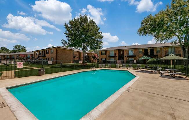 our apartments offer a swimming pool and a courtyard with picnic tables