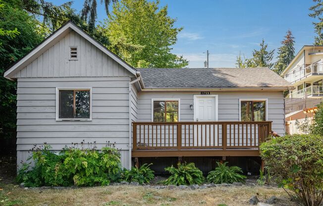 Charming 1 BD 1 BA cottage nestled on a beautifully landscaped lot