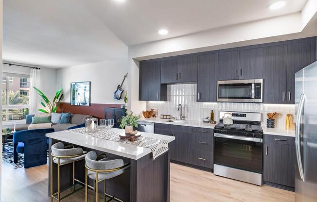 Our gourmet kitchens feature sleek quartz countertops, elegant tile backsplashes, and 42-inch custom cabinetry, offering both beauty and functionality. Elevate your culinary experiences in a space designed for chefs and food enthusiasts alike.