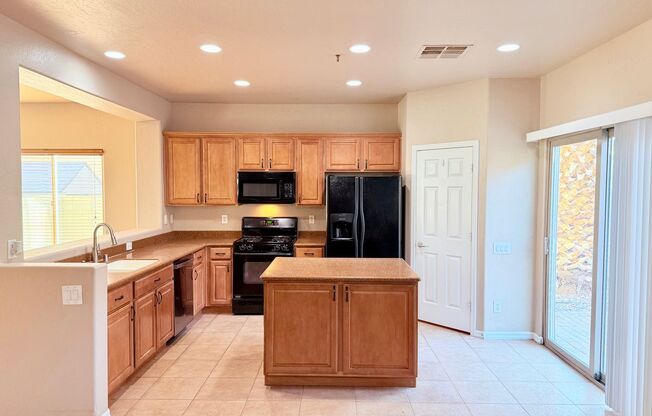 FIVE BEDROOMS, THREE FULL BATHROOMS, THREE CAR GARAGE AND HUGE LOFT! THE SPECIAL FEATURES INCLUDE: PRIMARY BEDROOM DOWNSTAIRS W FULL BATH