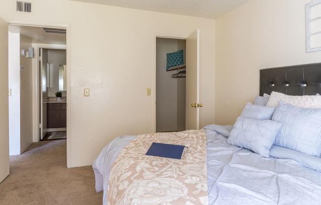 The Springs bedroom with nice natural lighting and carpet flooring