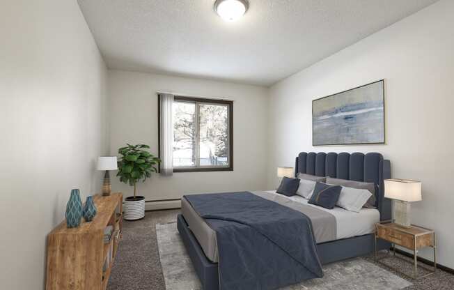 A tranquil bedroom at Glen Pond Apartments, Eagan, MN