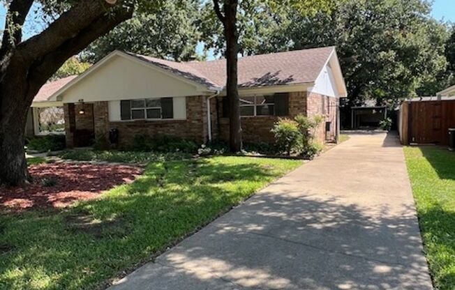 Charming 3-Bedroom Home with Gorgeous Trees in Prime Hurst Location!