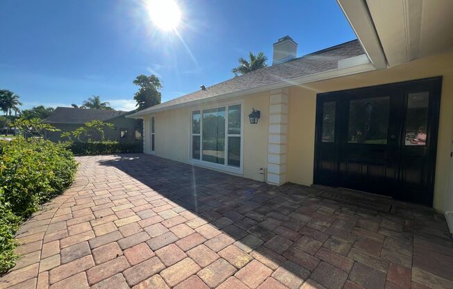 Updated 3-Bedroom Home with Spacious Yard & Community Amenities in a Prime Naples Location!