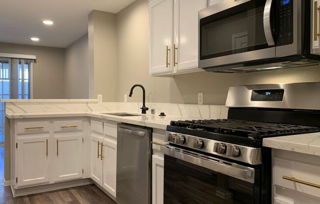 STUNNING REMODELED TOWNHOME — YOUR NEXT HOME JUST FOUND YOU!