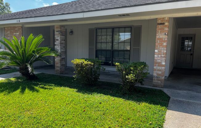 4 Bedroom, 2 Bathroom, large yard, 2 car carport, NEW floors and paint.