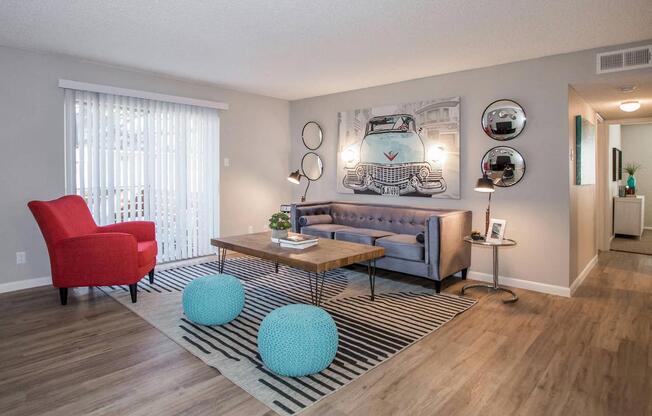 a living room with a couch and a table