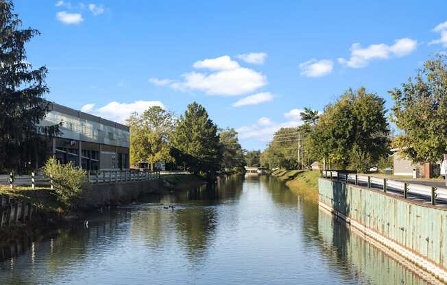 a river running through a city with buildings on either side