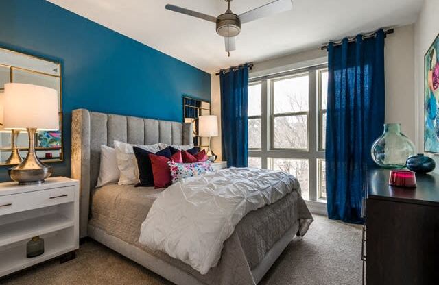 Bedroom with ceiling fan at Berkshire Chapel Hill, Chapel Hill, 27514