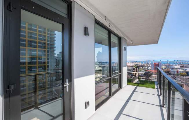 a view of the city from a balcony of a building