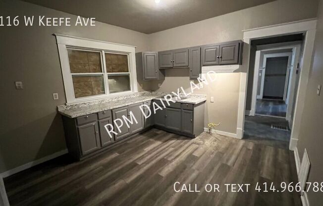 1116 W KEEFE AVE