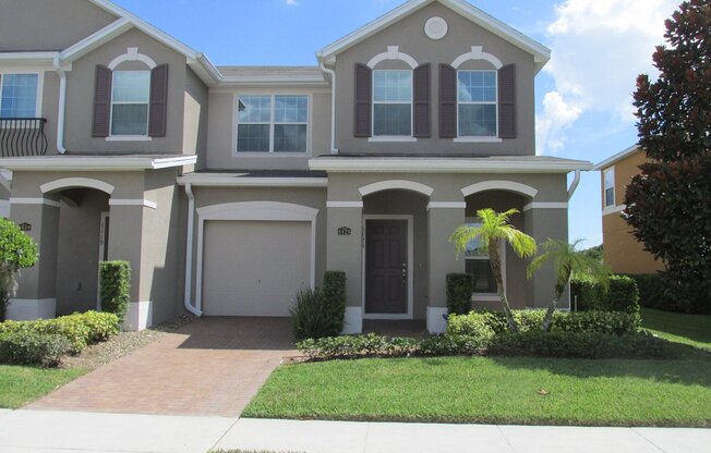 4 Bedroom 2.5 Bath, Single Car Garage, with Water View, Community Pool and  Town Home for Rent at 1123 Honey Blossom Drive. Orlando,  Fl. 32824.