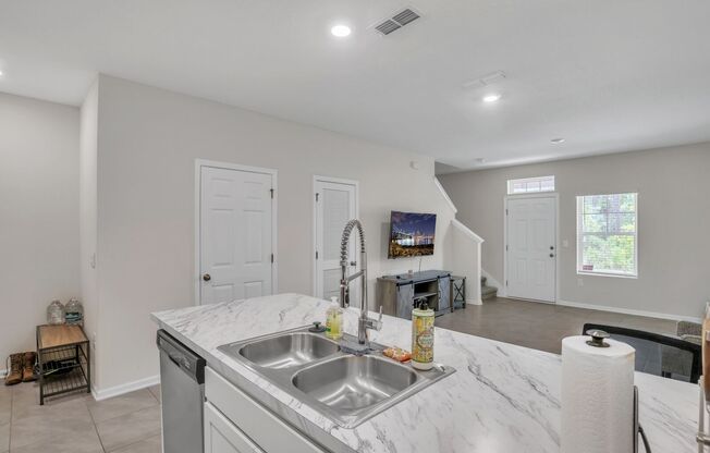 Like new 2 bedroom/ 2.5 bathroom with one car garage townhome in Nassau county!