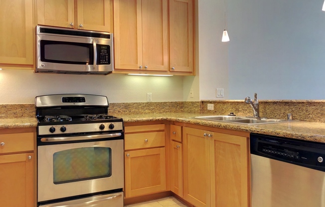 1 Bed, 1 Bath Penthouse Level Condo w Parking - Across from BART