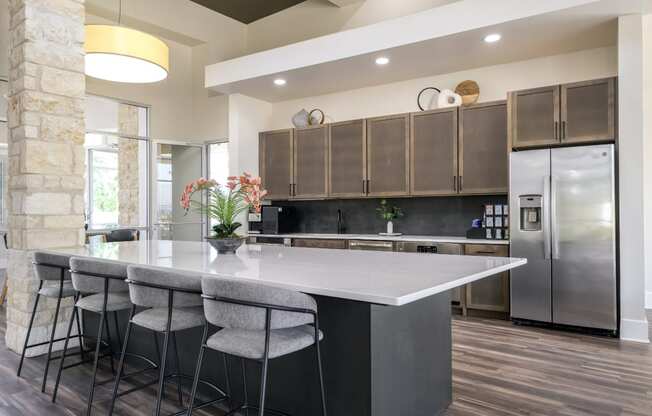 resident social area with demonstration kitchen at The Allure apartments