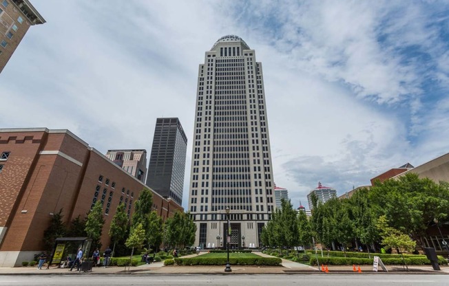 a tall building in the middle of a city street at 310 at Nulu Apartments-Student, Louisville, KY