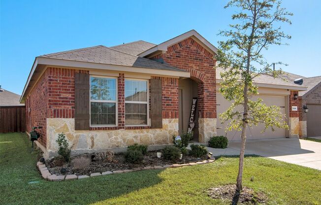 This 4-bedroom, 2-bath home is nestled within a pristine master-planned community and offers modern living in a newly constructed space.