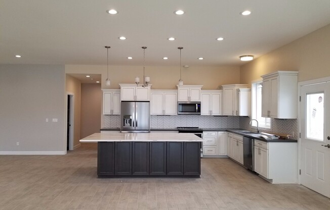 Occupied, do not disturb tenants. West Valley 3 bedroom 2.5 bath plus an office,  custom built rental home