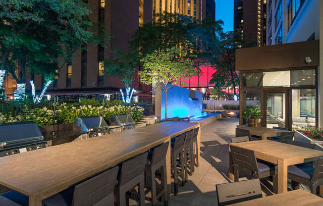 Fire Pit and Grilling Stations for Al Fresco Dining at Columbus Plaza, Chicago, IL