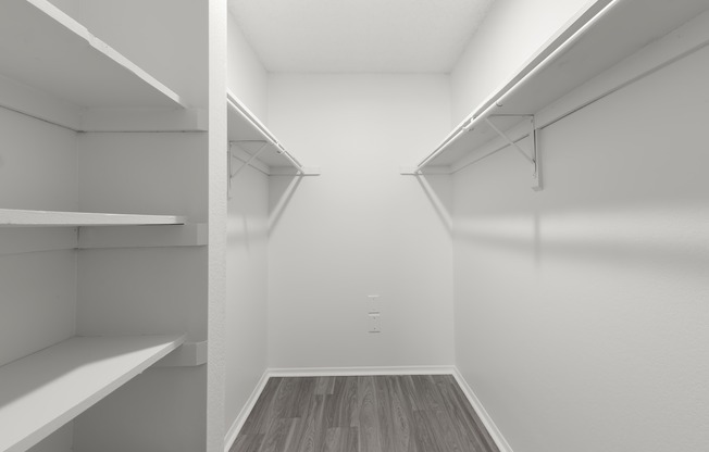 Spacious walk-in closet in an apartment on Coachman Rd in Clearwater, FL.
