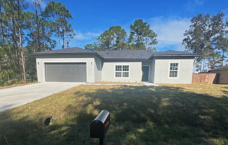 Be the FIRST to live in this BRAND NEW 3 Bedroom / 2 Bath Home in Palm Bay!!!